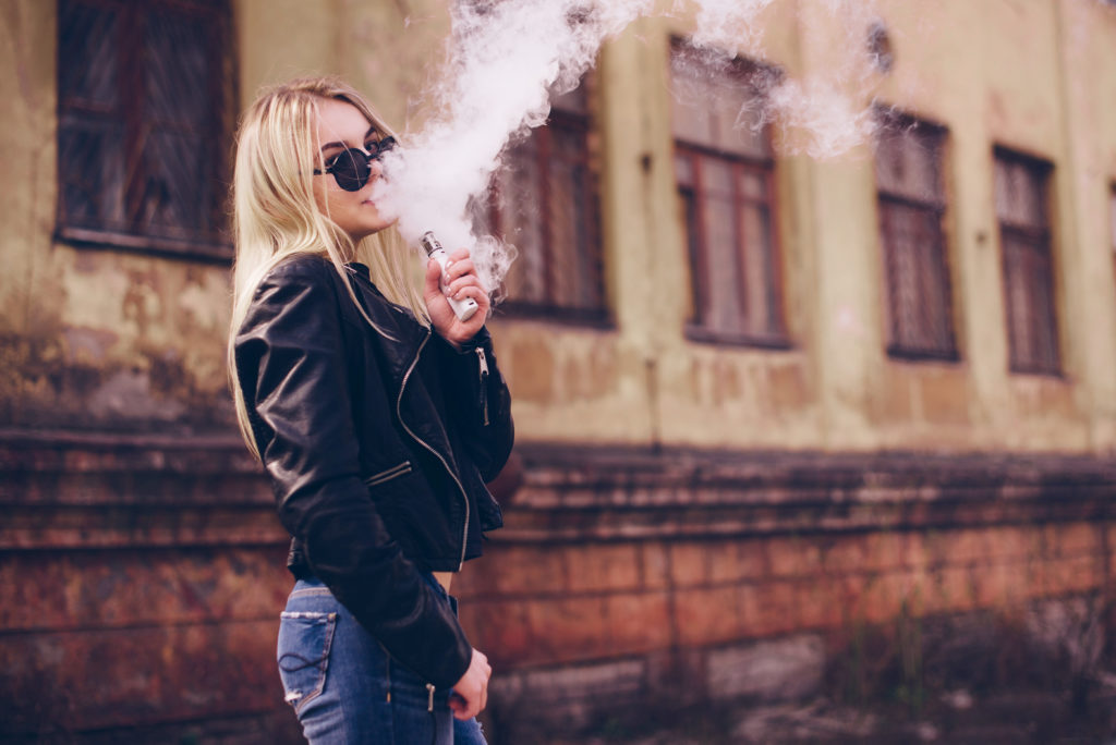 Vaping Young Beautiful Woman Vaping Vapor Concept